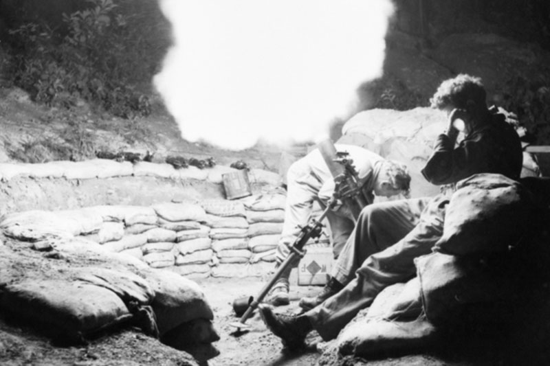 Image: Australian War Memorial | A three inch mortar of the 3rd Battalion, The Royal Australian Regiment (3RAR), firing at night during a battle on the Korean front. 