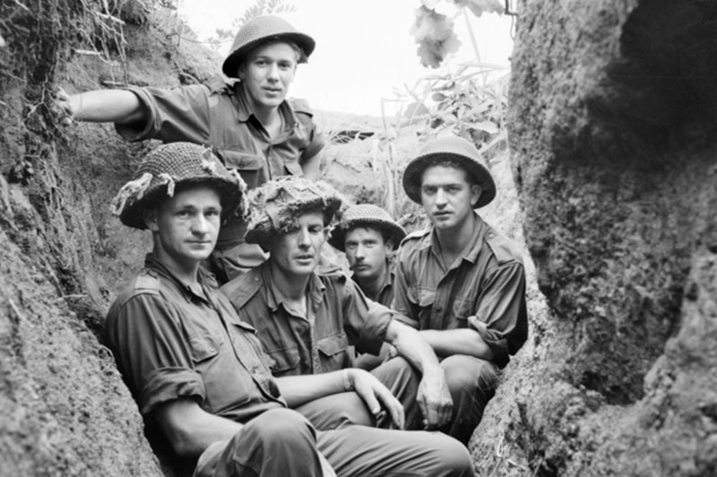 Image: Australian War Museum | Soldiers of C Company, 2nd Battalion Royal Australia Regiment (2RAR) at Majon'ni after relieving1st Battalion King's Regiment.