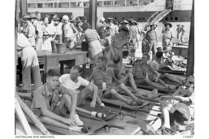 Australian prisoners of war wait to board the Manunda in September 1945. Photographer unknown, AWM 116057.